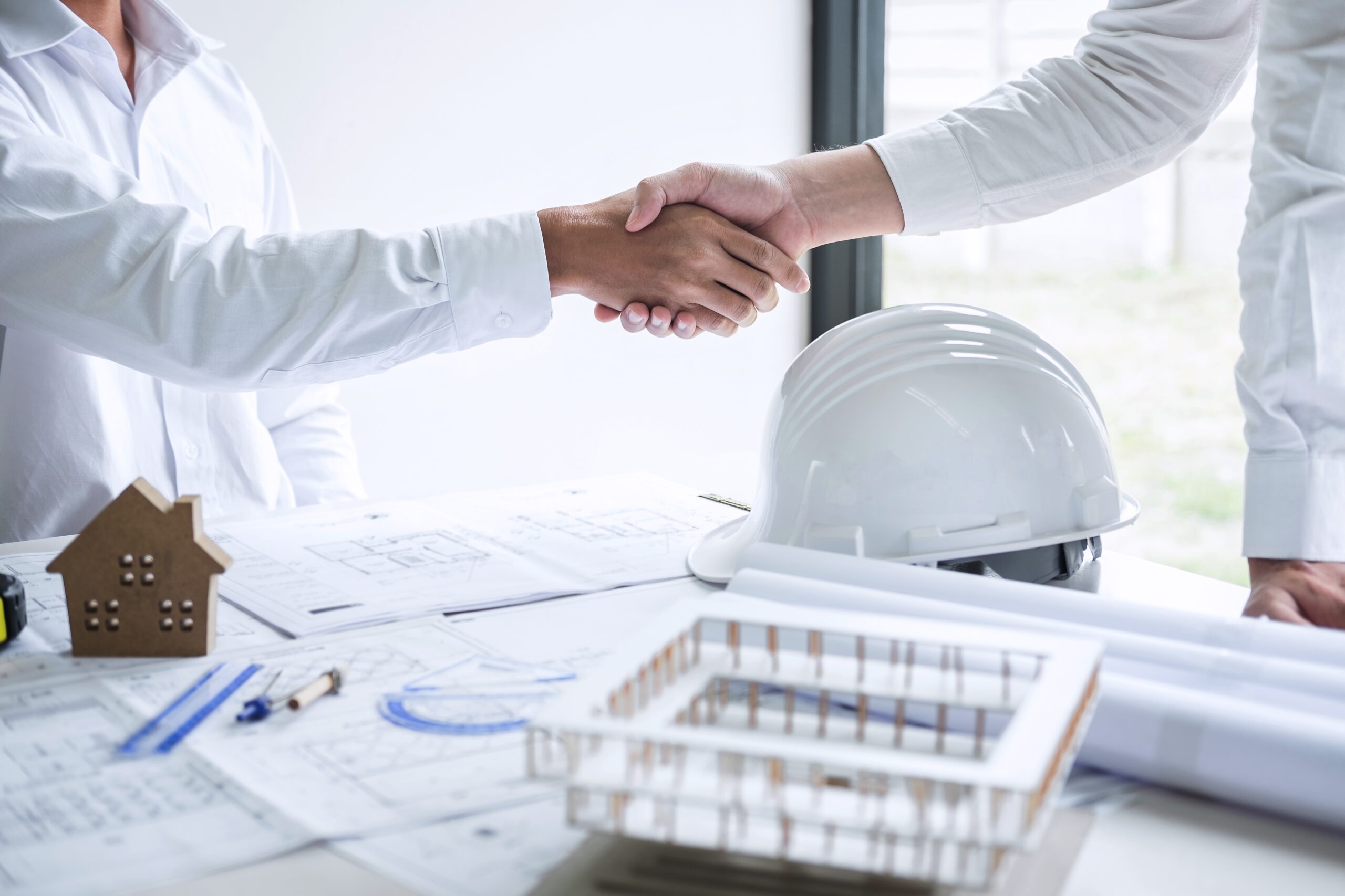 Handshake of collaboration, Construction engineering or architec